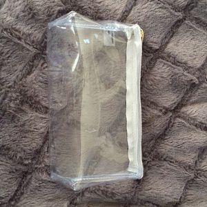 A clear cosmetics bag.